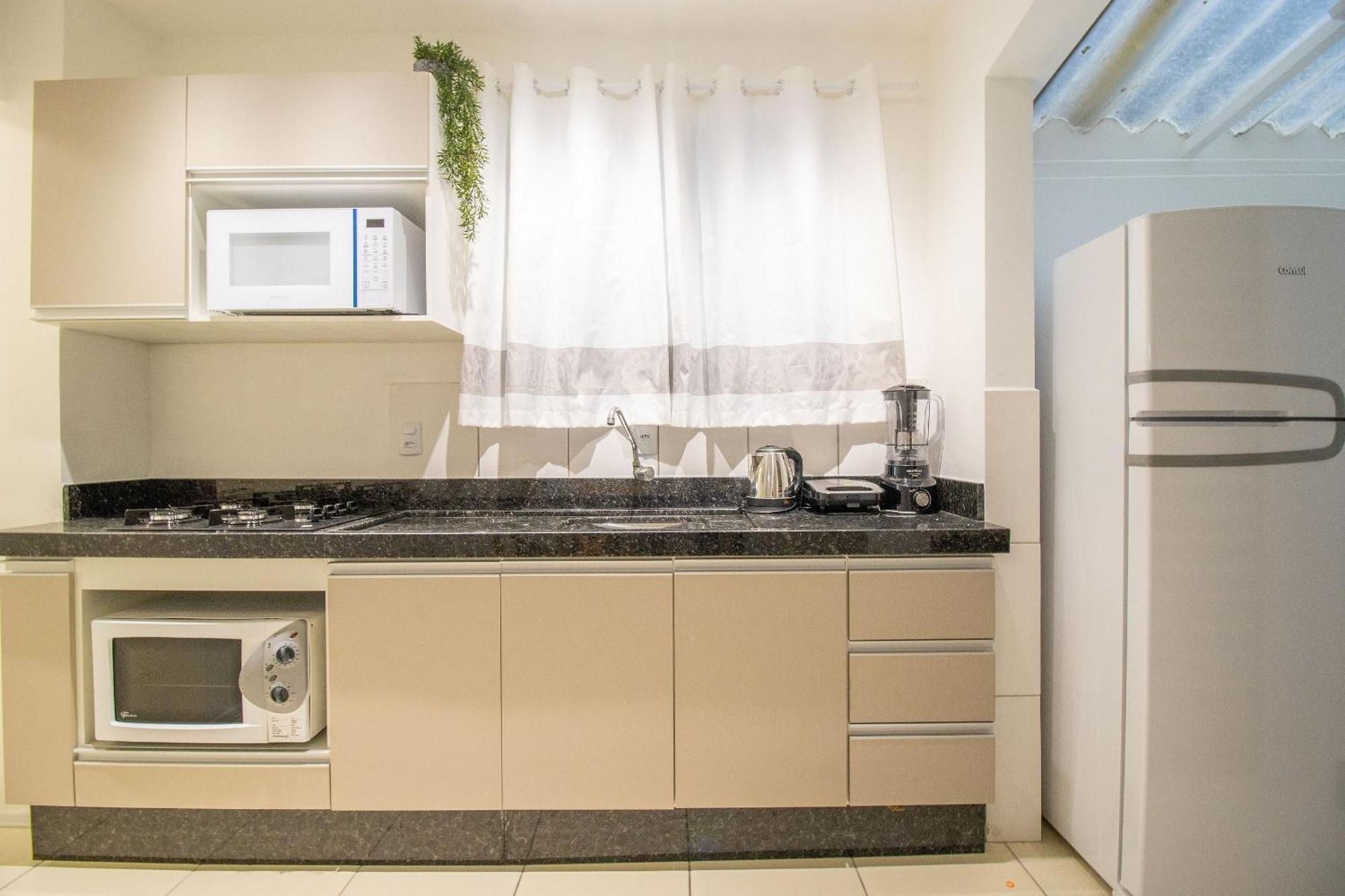 Joa24 - 2 Dorm, Totalmente Climatizado, Garagem